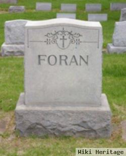 John E. Foran