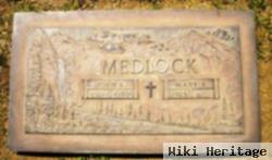 John E. Medlock