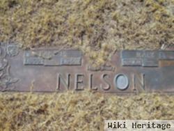 Earl H Nelson