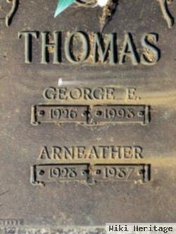 George E Thomas