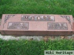 Enos C Moore