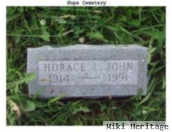 Horace L John