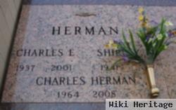 Charles E Herman