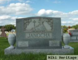 James J Janocha