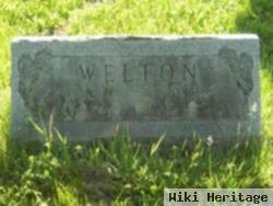 Robert E Welton