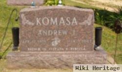 Andrew J Komasa