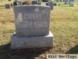 Thomas W Mills