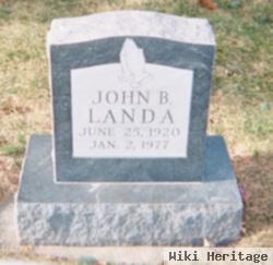 John B Landa