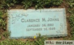 Clarence M Johns