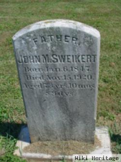 John M. Sweikert