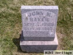 John M Baker