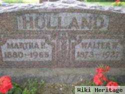 Walter W Holland