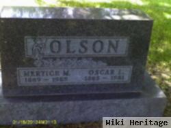 Oscar L Olson