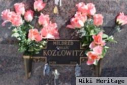 Mildred "millie" Kuga Kozlowitz