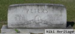 Virgil A Peters