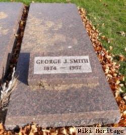 George J Smith