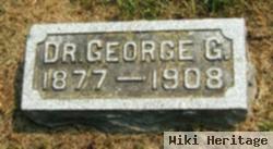 Dr George G Free