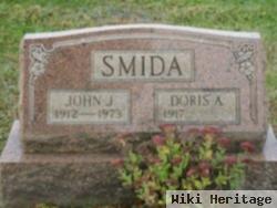 John J Smida