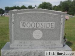 Claude L Woodside