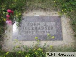 John J Holzhauser