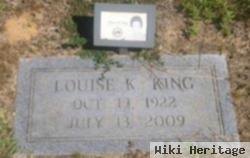Louise K King