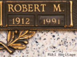 Robert M Stroud