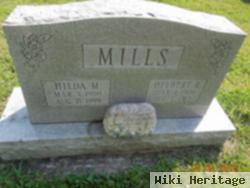 Delbert R Mills