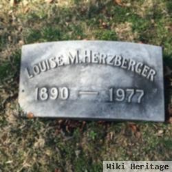 Louise M Herzberger