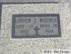 Luther J Russell