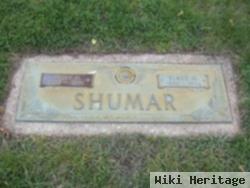 Elmer M Shumar