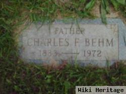 Charles F Behm