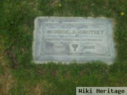 Monroe D Grotsky