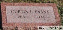 Curtis L. Evans