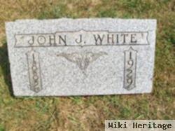 John J White