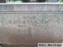 Dr John H. Raach