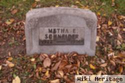 Metha E Schneider