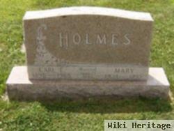 Carl E Holmes