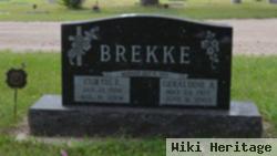 Curtis E Brekke