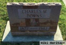 Charles M Downs
