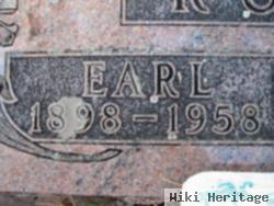 Earl J Rush