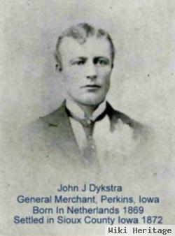 John J Dykstra