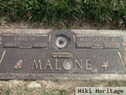 Earl M Malone