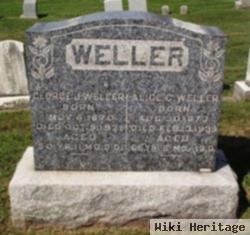 George J Weller