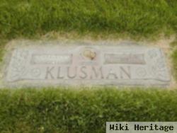 Charles F Klusman