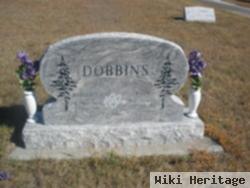 Ray E. Dobbins