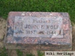 John P. Wolf