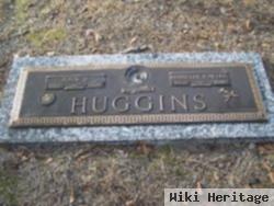 John D. Huggins