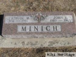 John E. Minich