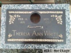 Theresa A White