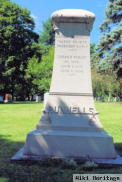 Daniel F Runnells